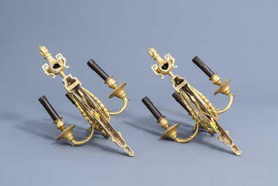 A pair of French Louis XVI three-branch ormolu wall lights in the manner of Jean-Charles Delafosse (1734-1789), 18th C.