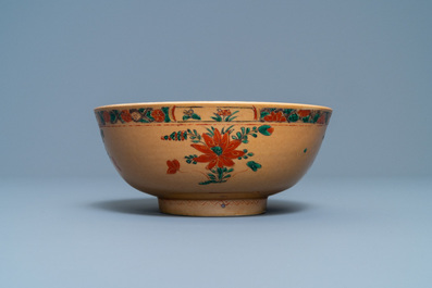 A Chinese capucine brown-ground famille verte bowl, Kangxi
