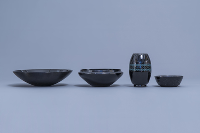 A varied collection of black glass vases and bowls, a.o. Art Deco 'Booms' glass, 20th C.