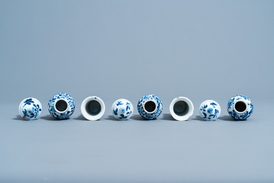A Chinese blue and white five-piece garniture with floral design, 19th C.