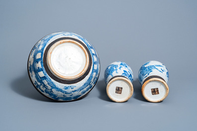 Two Chinese Nanking crackle glazed blue and white 'warrior' vases and a 'landscape' bowl, 19th/20th C.