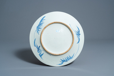 A Chinese blue and white charger with a river landscape, Jiaqing