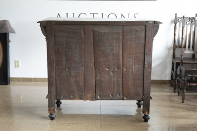 A Flemish oak wooden buffet dresser with architectural design and lion heads, partly 16th C. and later