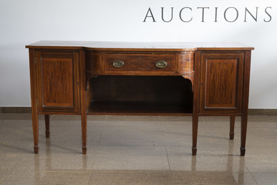 An English George III mahogany sideboard with a drawer over two doors, ca. 1800