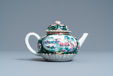 A Chinese famille noire teapot on stand, Yongzheng