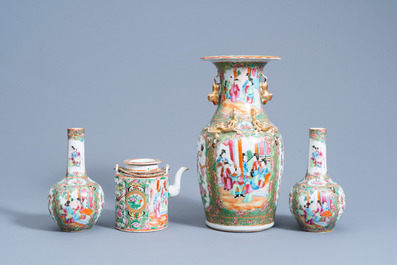 Eight Chinese Canton famille rose vases and a teapot and cover, 19th C.