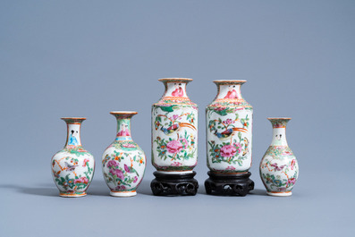 Eight Chinese Canton famille rose vases and a teapot and cover, 19th C.