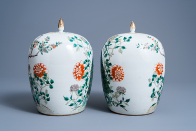 Two Chinese famille verte jars and covers with pheasants between blossoming branches, 19th C.