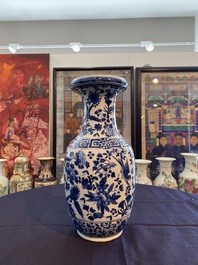 A Chinese blue and white vase with birds among blossoming branches, 19th C.