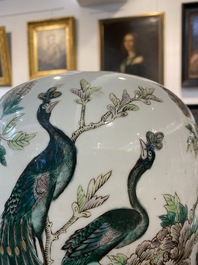 Two Chinese famille verte jars and covers with pheasants between blossoming branches, 19th C.