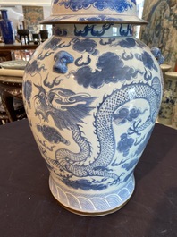 Two Chinese blue and white 'Xi' jars and covers and a 'dragons chasing the pearl' vase and cover, 19th/20th C