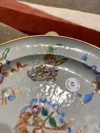 A Chinese Canton famille rose 'antiquities' warming plate, 19th C.
