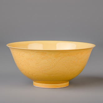 A Chinese yellow ground bowl with incised underglaze design, Yongzheng mark, 19th/20th C.