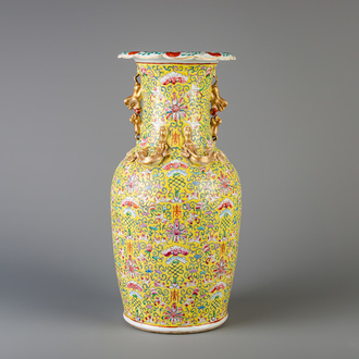 A Chinese famille rose yellow ground 'bats and shou' vase, 19th C.