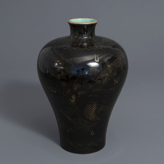A Chinese black ground meiping vase with a gilt dragon chasing the pearl, Qianlong mark, 19th/20th C.