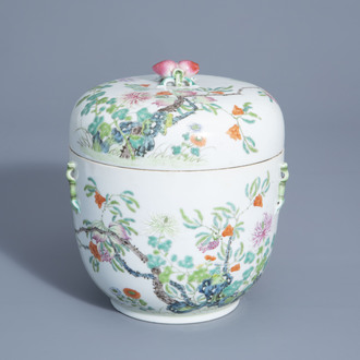 A Chinese famille rose jar and cover with floral and relief design, 19th/20th C.