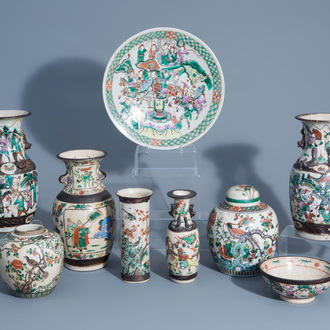 A varied collection of Chinese Nanking crackle glazed famille rose vases, ginger jars, a charger and a bowl, 19th/20th C.