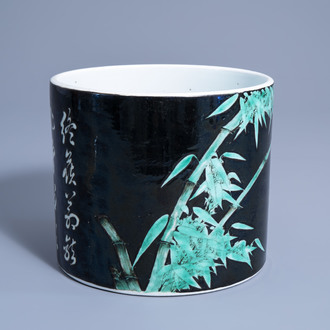 A Chinese famille noire brush pot with bamboo and calligraphy, 19th/20th C.