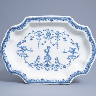 A blue and white 'Bérain' dish, De Clerissy workshop, Moustiers, France, 18th C.