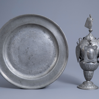 A Bruges pewter charger with maker's mark P.D.P. and a covered guild cup of the tin workers guild, 18th C. and possibly later