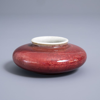 A Chinese monochrome copper red brush washer with underglaze design, 19th/20th C.
