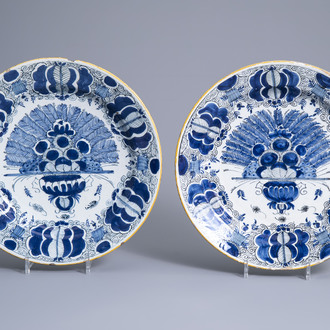 Two Dutch Delft blue and white 'peacock tail' chargers, 18th C.