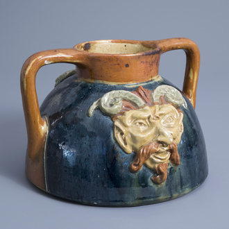 A Flemish polychrome pottery 'mascarons' jug, Torhout, first half of the 20th C.