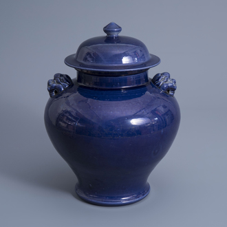 A Chinese monochrome blue vase and cover with lion heads, 19th/20th C.