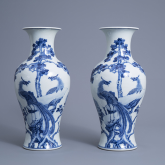 A pair of Chinese blue and white 'phoenix' vases, Republic, 20th C.
