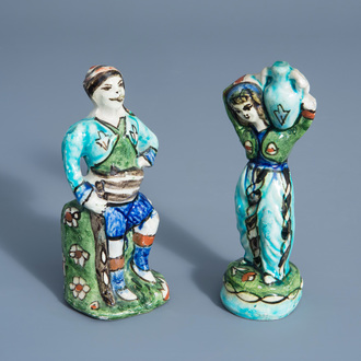 Two polychrome pottery figures, Qajar, Iran, 19th C.