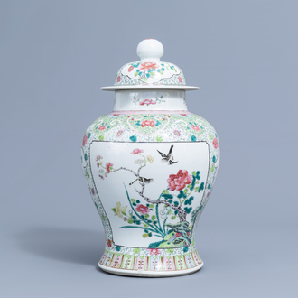 A Chinese famille rose vase and cover with birds among blossoming branches, 19th/20th C.