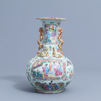 A Chinese Canton famille rose bottle vase with relief design, 19th C.