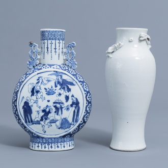A Chinese blue and white moonflask and a blanc de Chine vase with dragon relief design, 19th C.