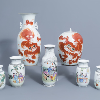 A Chinese iron red vase and jar and cover with Buddhist lions and five famille rose vases, 19th/20th C.
