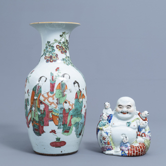 A Chinese famille rose figure of Buddha with children and a vase with figures on a terrace, 19th/20th C.