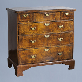 An English George I walnut chest with three short and three long graduated drawers, first half of the 18th C.