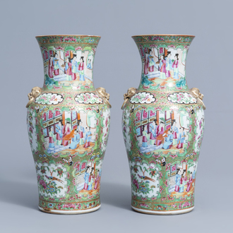 A pair of Chinese Canton famille rose baluster vases, 19th C.