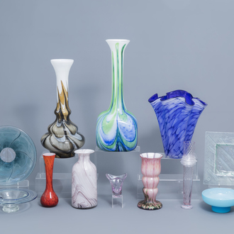 A varied collection of glass design vases and some chargers, various origins, 20th C.