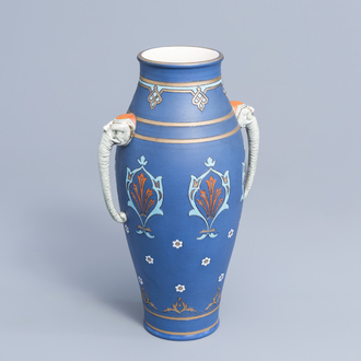 Un vase à fond bleu à décor floral et poignées en forme de tête d'éléphant, Mettlach, Villeroy & Boch, première moitié du 20ème siècle