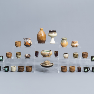 A varied collection of polychrome cups, bowls, jugs and a box and cover, a.o. Thulin, 20th C.