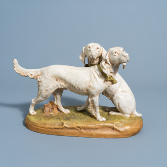 Hermann Schubert (1831-1917): A polychrome decorated biscuit group of two dogs, Royal Dux
