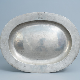A large monogrammed pewter charger, probably France, 18th/19th C.