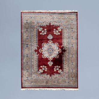 A Turkish Kayseri rug with flower vases, wool on cotton, second half of the 20th C.