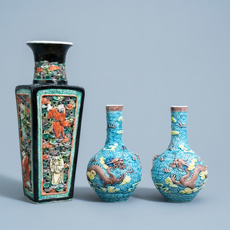 A pair of Chinese polychrome 'dragon' vases and a quadrangular 'Immortals' vase, 19th/20th C.