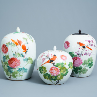 Three Chinese qianjiang cai jars and covers with a bird among blossoming branches, 19th/20th C.