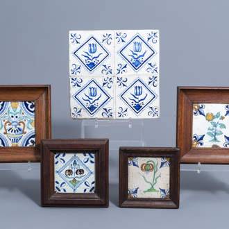 Eight Dutch Delft blue, white and polychrome tiles with flowers, 17th C.