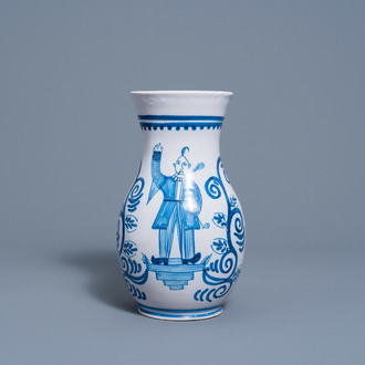 A blue and white Brussels faience 'chinoiserie' vase with a pipe smoker, ca. 1800