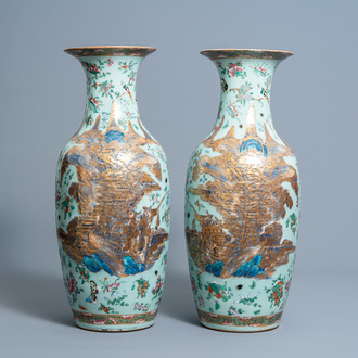 A pair of Chinese Canton famille rose celadon ground vases with figures in a landscape, flowers and insects, 19th C.