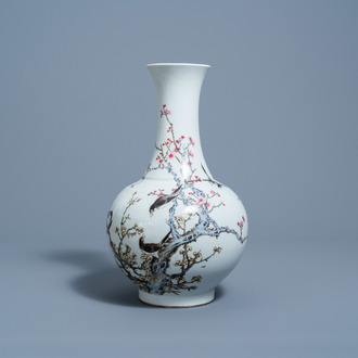 A Chinese famille rose vase with birds among blossoming branches, Qianlong mark, 19th C.