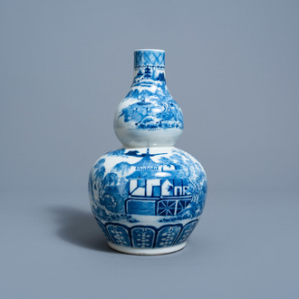 A Chinese blue and white double gourd 'landscape' vase, 19th C.